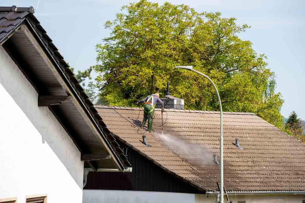 Roofers soft washing a roof Hoschton, GA Roofers soft washing a roof Hoschton, GA