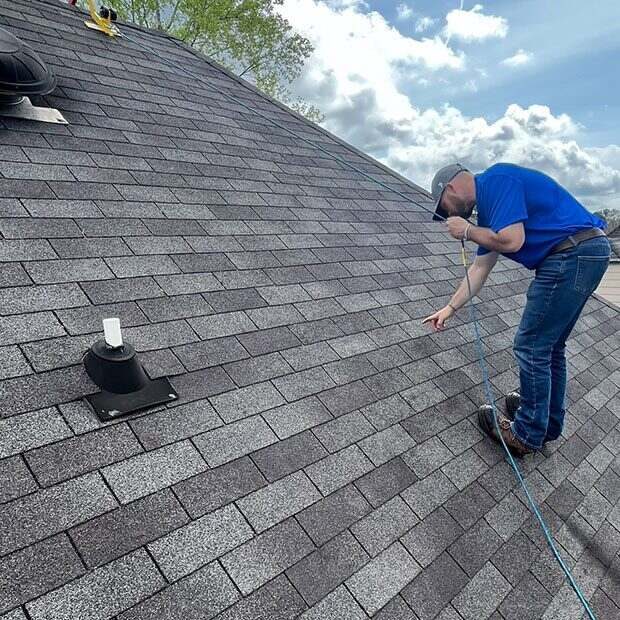 roofing contractor inspecting roof roofing contractor inspecting roof